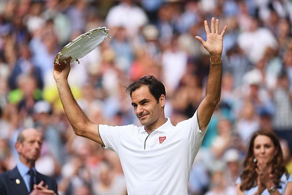 Federer acknowledges the crowd following a heartbreaking defeat in the 2019 Wimbledon final
