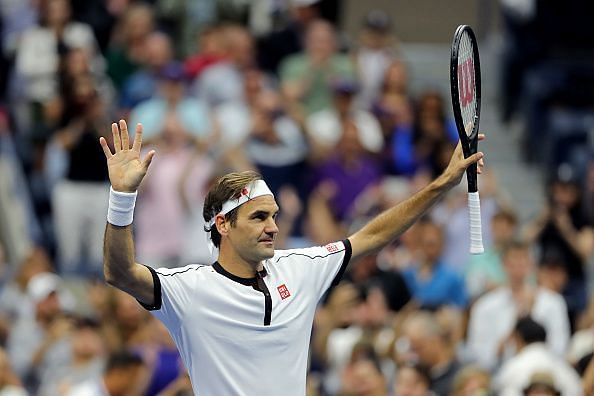 Federer acknowledges the crowd after a win in his 100th match at the US Open