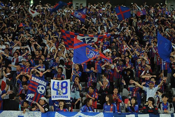 FC Tokyo fans cheer on their side