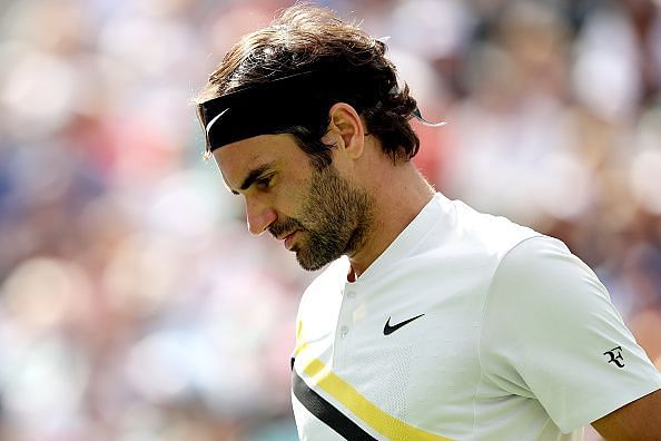 Federer looks dejected after squandering championship points in the 2018 final against Del Potro