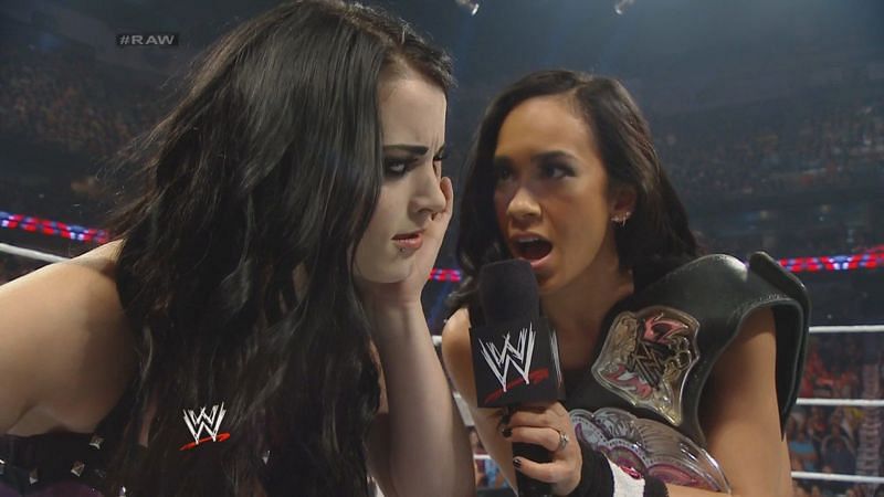 AJ Lee challenges Paige to a title match on her main roster debut