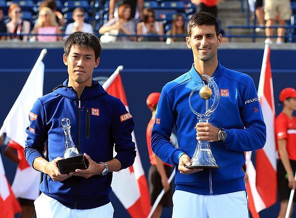 Djokovic celebrates his 4th Rogers Cup after beating Nishikori in the 2016 Toronto final