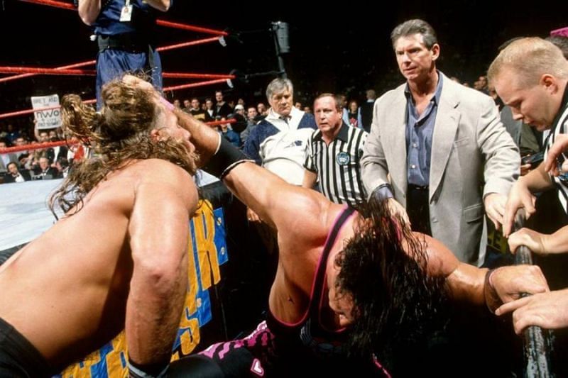 This shot contains all of the principals of the Montreal Screwjob: Vince, Bret, HBK, and Earl Hebner (referee.)