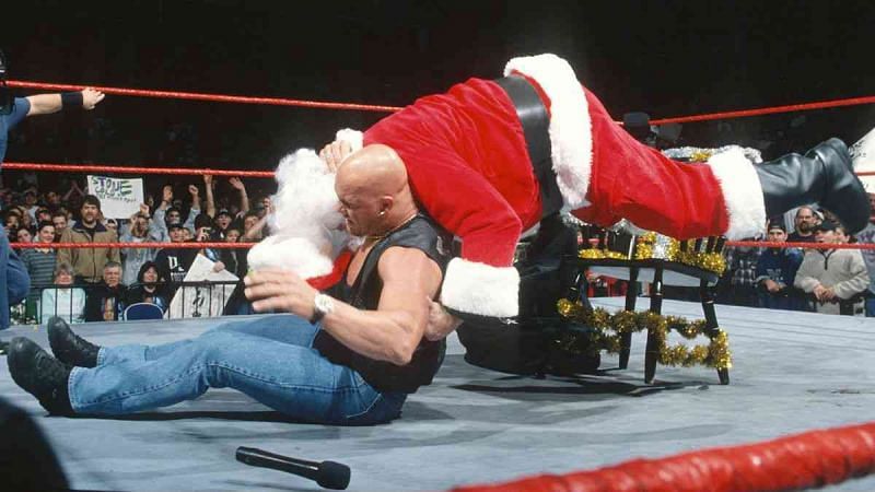 Stone Cold Steve Austin delivers the Stone Cold Stunner to Santa Claus on Raw.
