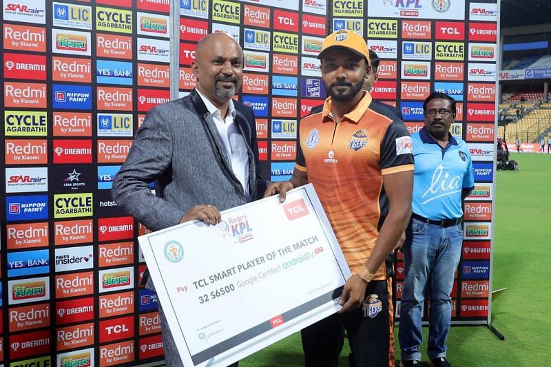 KB Pawan receiving a &#039;Man of the Match&#039; award for a fifty against Shivamogga earlier in the season
