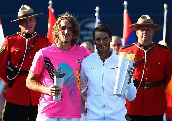 Nadal poses with runner-up Tsitsipas after the 2018 final in Toronto