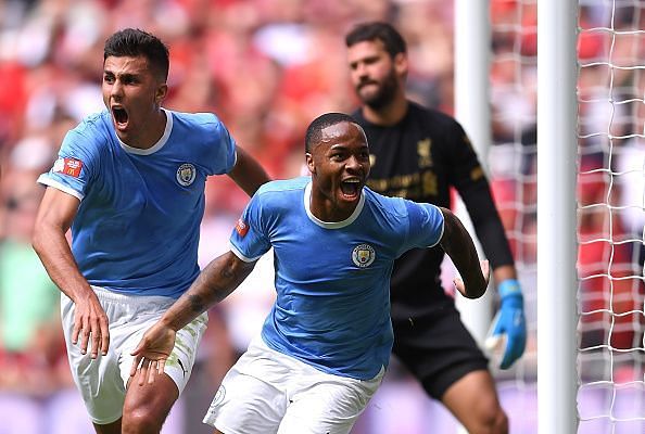 Sterling wheels away to celebrate his goal with Rodri - his first in 11 appearances against Liverpool