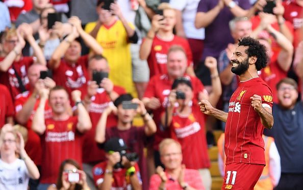 Mo Salah celebrates in front of the boisterous Anfield crowd.