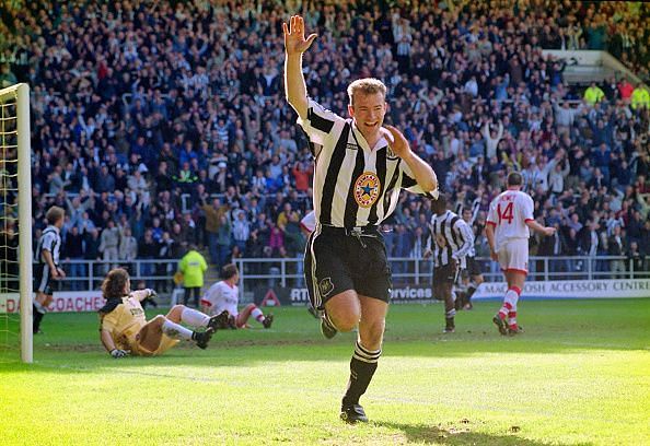 Alan Shearer in Premier League action for Newcastle