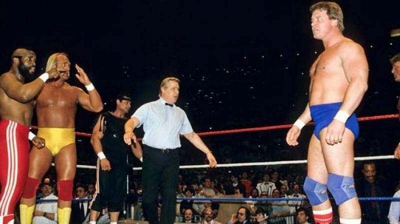 Roddy Piper faces off against Hulk Hogan and Mr. T at Wrestlemania I.