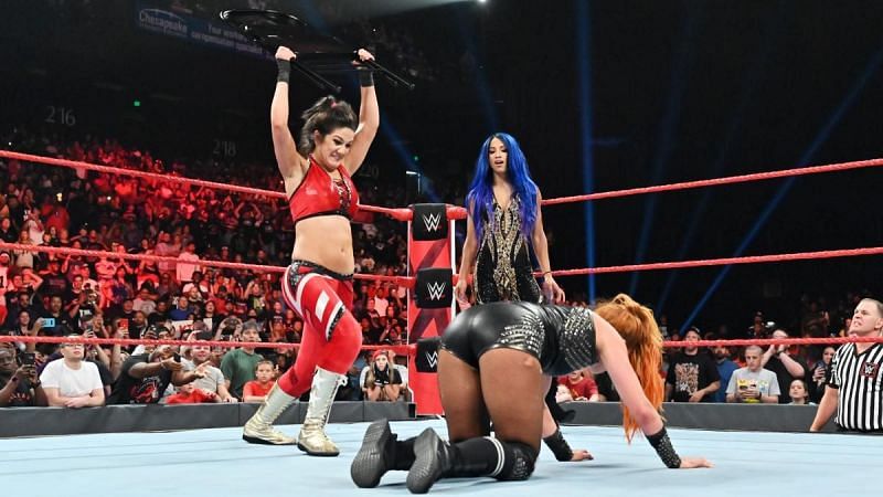 Becky Lynch taking another chair shot from Bayley