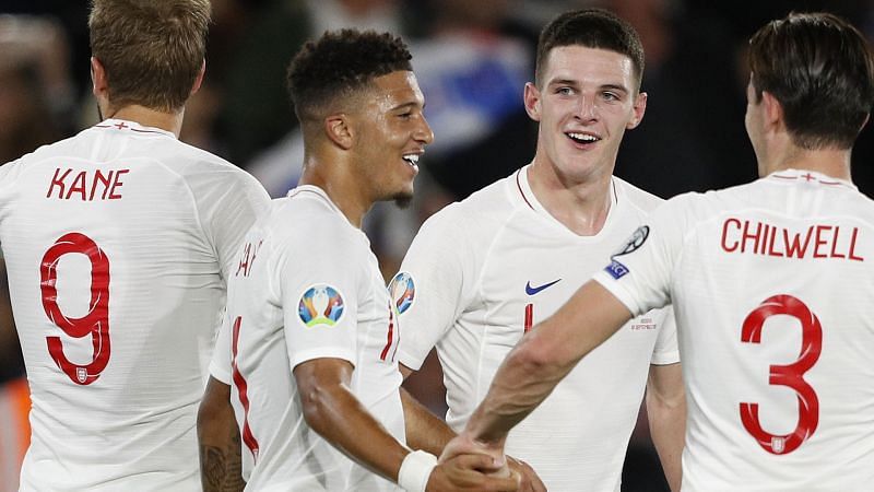 Jadon Sancho (2nd from left) rejoices with teammates after scoring against Kosovo
