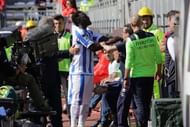 Pescara player Sulley Muntari was penalized for reporting racist behavior