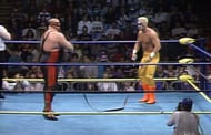 Sting and Vader in a vicious strap match.