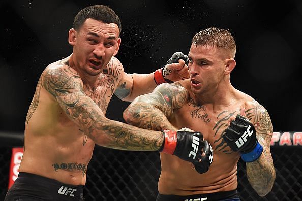 Max Holloway takes a punch during UFC 236 Holloway v Poirier 2