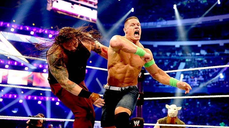 John Cena wallops Bray Wyatt at WrestleMania XXX.