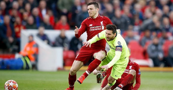 Andy Robertson vying for the ball with Barcelona&#039;s Lionel Messi during UCL 2018/19