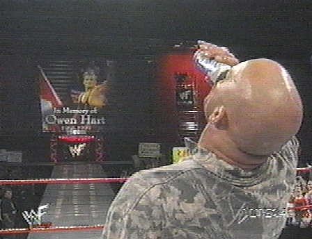 Stone Cold toasts Owen Hart at Raw is Owen in 1999.