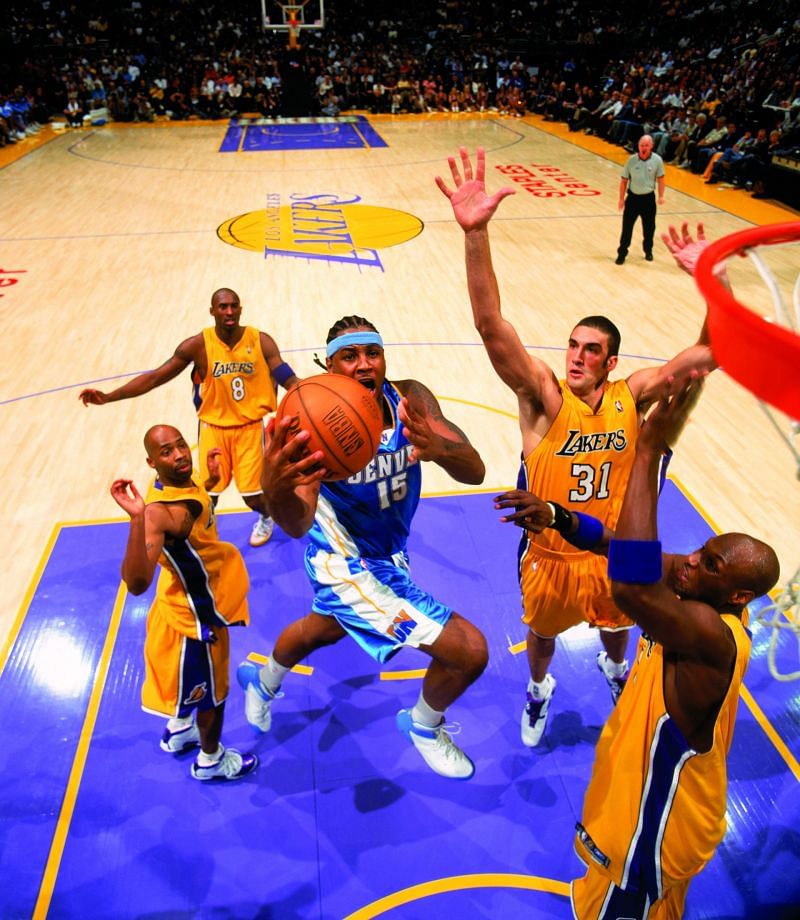 Melo wearing the Jordan Melo 1.5 as he soars for a layup (Image: nicekicks.com)