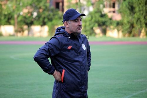 Igor Stimac looks on at India's players during a practice session in Guwahati