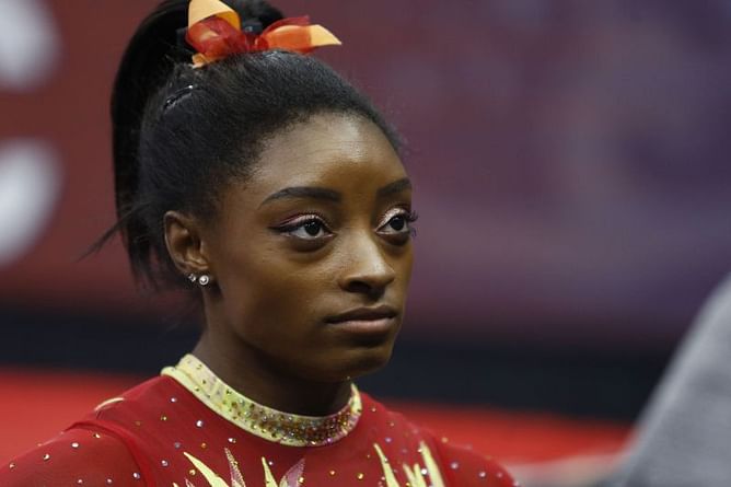 Simone Biles 'aches' for victims after brother charged
