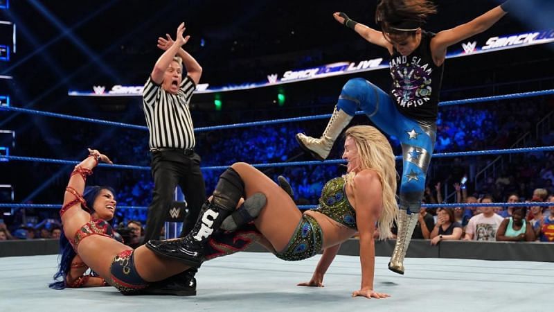 Bayley saves her best friend from a submission loss to Charlotte Flair