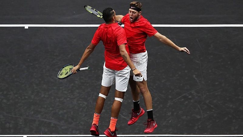 Kyrgios (left) and Sock rejoice after their win over Nadal and Tsitsipas