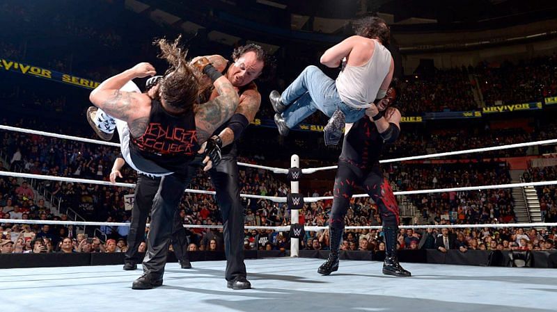 The Brothers of Destruction perform simultaneous chokeslams on the Wyatt Family.
