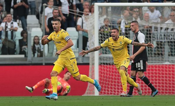 Miguel Veloso (l) celebrates