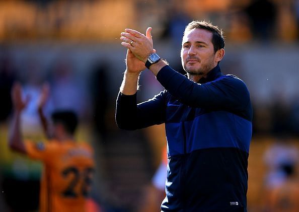 Frank Lampard applauds the travelling fans