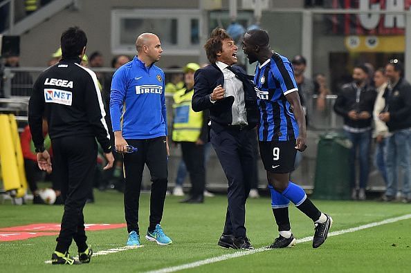Romelu Lukaku (far right) celebrates with his manager, Antonio Conte