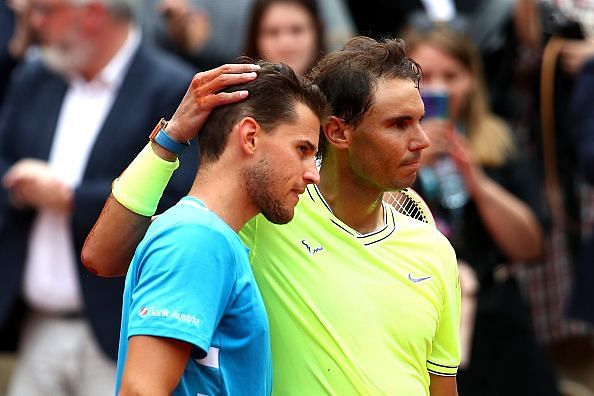 Can Dominic Thiem (L) emulate Rafael Nadal to become an all-surface player?
