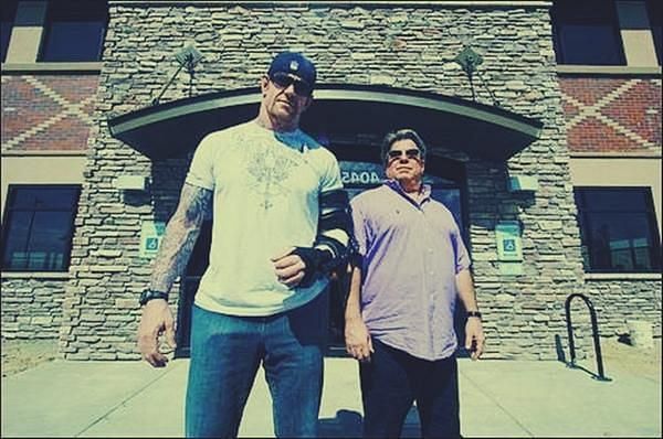 Undertaker and his business partner Scott Everhart outside their building