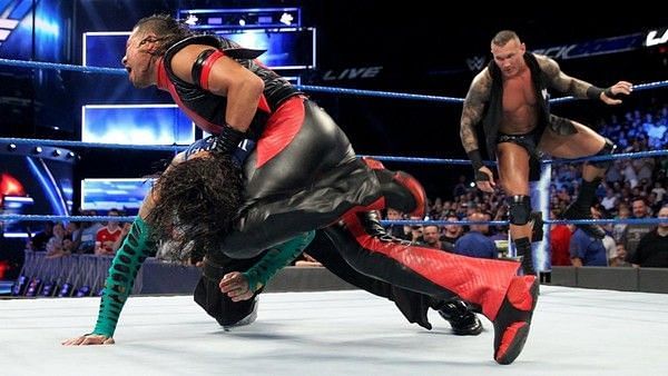 Both Orton and Shinsuke are more than willing to take advantage of a downed opponent.