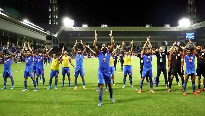 Team India celebrate before the away crowd