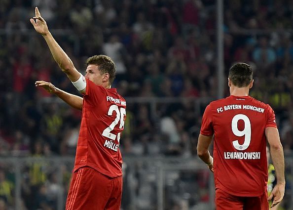 Bayern Muenchen&#039;s Thomas Muller and Robert Lewandowski