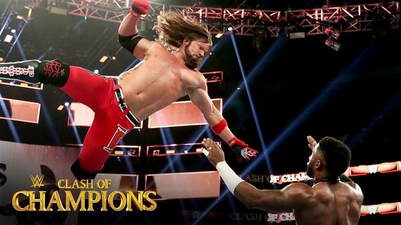 US Champion AJ Styles flies through the air against number one contender Cedric Alexander