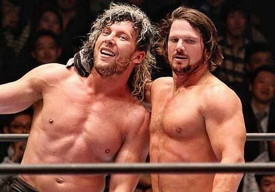 Kenny Omega (left) with AJ Styles (right)
