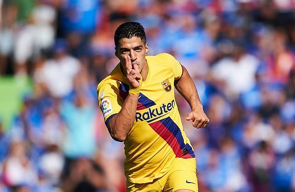 Luis Suarez opened the scoring against Getafe with a lobbed finish