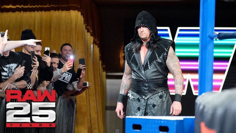 It an&#039;t over til it&#039;s over: The Undertaker at the Raw 25th anniversary.