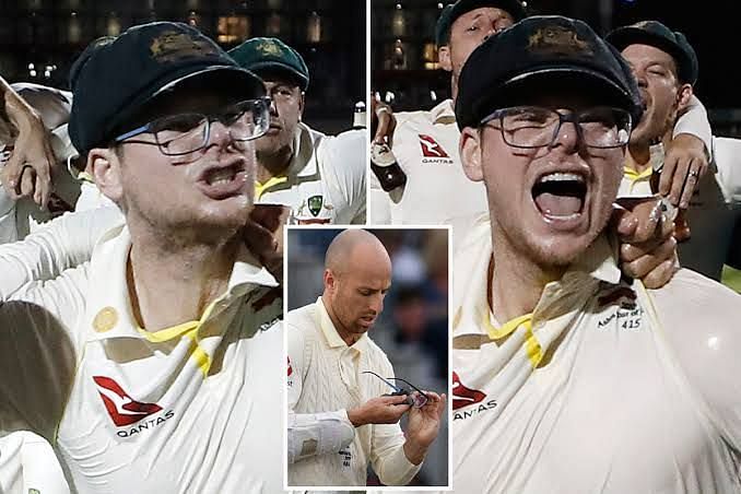 Steve Smith was seen wearing glasses during the victory celebrations (Image: The Sun)