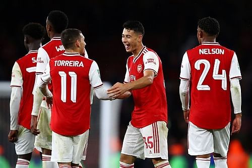 Arsenal players celebrate a goal