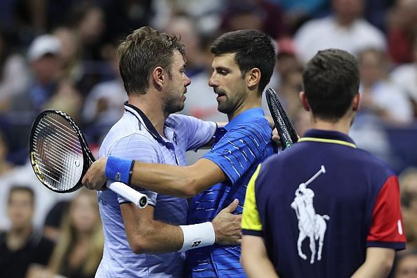 The 2016 US Open finalists meet at the net following Djokovic&#039;s retirement due to injury