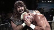 Cactus Jack rakes the eyes of Sting.