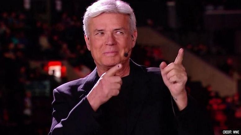 Eric Bischoff using both of his pointer fingers for non-verbal communication.