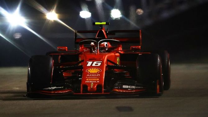 Charles Leclerc takes shock Ferrari pole in Singapore