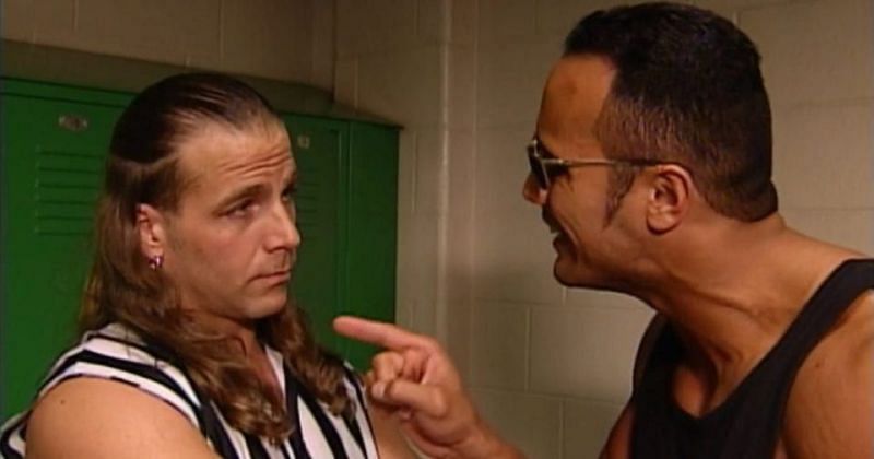 Shawn Michaels (L) and The Rock (R)
