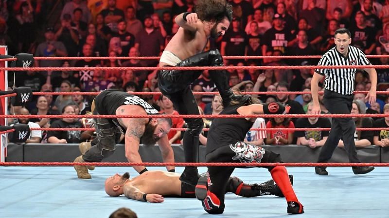 The Universal title match is between the reigning RAW tag team champions Seth Rollins and Braun Strowman.