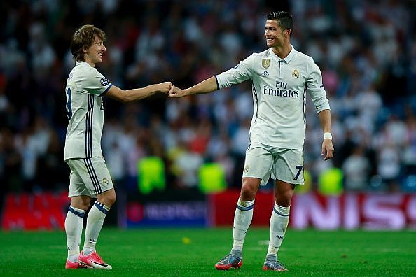 Luka Modric (L) and Cristiano Ronaldo