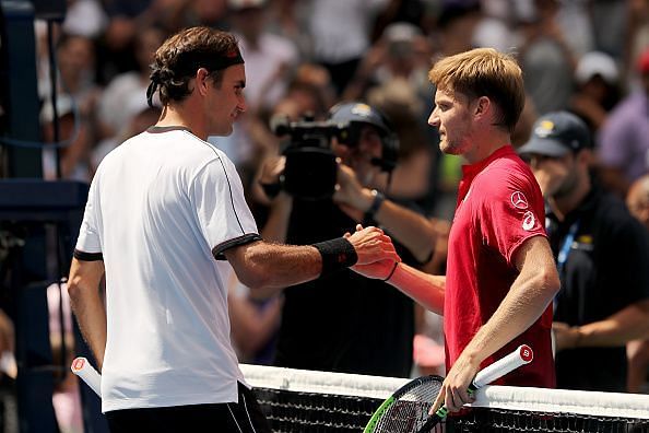 Roger Federer (L) and David Goffin